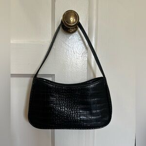 Black snake skin mini purse.